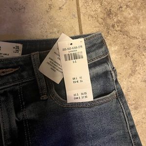 Hollister  curvy ultra high rise ripped medium wash skinny ankle jeans